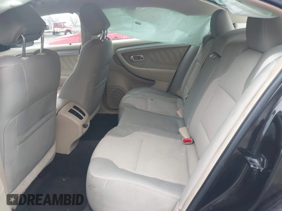 2013 Ford Taurus SEL with VIN 1FAHP2E83DG107913, listed as a IAAI auction lot 42007575 with 147,240 mi miles. Bid and sale history available at carsss.com. Image 8.