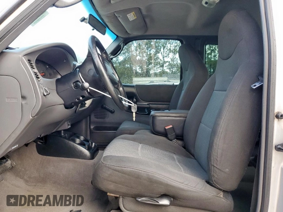 2003 Ford Ranger XL with VIN 1FTYR14V13PA20094, listed as a Copart auction lot 59298375 with 190,728 mi miles and Salvage title. Bid and sale history available at DreamBid. Image 7.
