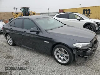 2011 BMW 5 Series 528i with VIN WBAFR1C57BDS35260, listed as a Copart auction lot 52989735 with 194,734 mi miles and Salvage Title. Bid and sale history available at carsss.com. Image 4.