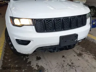 2019 Jeep Grand Cherokee Laredo E with VIN 1C4RJFAG1KC818289, listed as a IAAI auction lot 41602541 with 59,356 mi miles. Bid and sale history available at carsss.com. Image 22.