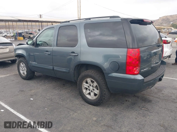 2008 GMC Yukon SLE w/3SA with VIN 1GKFC13C28J166446, listed as a IAAI auction lot 41531715 with 126,926 mi miles. Bid and sale history available at carsss.com. Image 3.