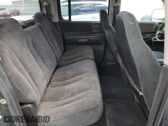 2001 Dodge Dakota z VIN 1B7HG2AX81S320355, wystawiony jako Copart lot #55410715 z przebiegiem 164 931 mil mil oraz Szkoda całkowita • Salvage title. Historia ofert i sprzedaży dostępna na DreamBid. Obrazek 10.