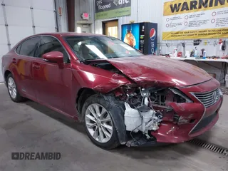 2014 Lexus ES 300h z VIN JTHBW1GG3E2056525, wystawiony jako IAAI lot #41670697 z przebiegiem 204 781 mil mil oraz . Historia ofert i sprzedaży dostępna na DreamBid. Obrazek 1.