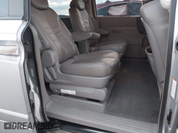 2007 Kia Sedona LX with VIN KNDMB233976172127, listed as a IAAI auction lot 41557356 with 164,383 mi miles. Bid and sale history available at carsss.com. Image 8.
