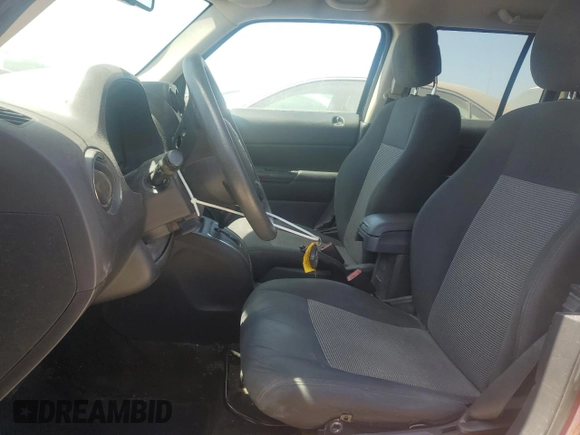 2014 Jeep Patriot Altitude with VIN 1C4NJPBA3ED818713, listed as a Copart auction lot 52256865 with 135,274 mi miles and Salvage title. Bid and sale history available at DreamBid. Image 7.