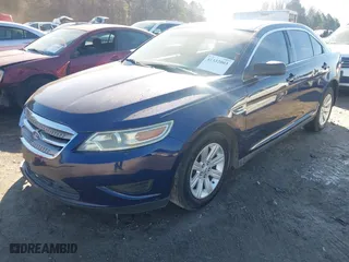 2011 Ford Taurus SE with VIN 1FAHP2DW7BG150440, listed as a IAAI auction lot 41332003 with 233,596 mi miles. Bid and sale history available at carsss.com. Image 18.