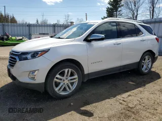 2021 Chevrolet Equinox Premier z VIN 2GNAXXEV6M6137669, wystawiony jako Copart lot #53437745 z przebiegiem 93 812 mil mil oraz Szkoda całkowita • Salvage title. Historia ofert i sprzedaży dostępna na DreamBid. Obrazek 1.