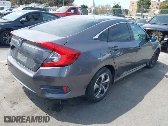 2017 Honda Civic LX with VIN 2HGFC2F52HH566363, listed as a IAAI auction lot 41934807 with 94,063 mi miles and . Bid and sale history available at DreamBid. Image 4.