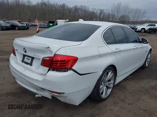 2014 BMW 5 Series 535i xDrive with VIN WBA5B3C57ED537549, listed as a IAAI auction lot 41047583 with 69,005 mi miles and . Bid and sale history available at carsss.com. Image 6.