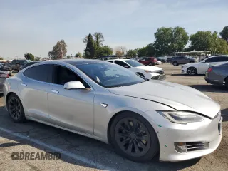 2016 Tesla Model S 90D with VIN 5YJSA1E2XGF155351, listed as a Copart auction lot 46700225 with 133,652 mi miles and Salvage Title. Bid and sale history available at DreamBid. Image 4.