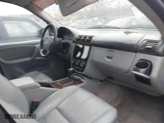 2004 Mercedes-Benz M-Class 3.5L with VIN 4JGAB57E74A465304, listed as a IAAI auction lot 41684081 with 999,999 mi miles. Bid and sale history available at carsss.com. Image 5.