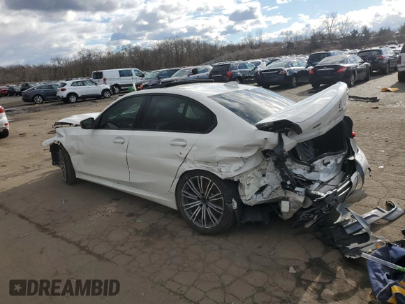 2020 BMW 3 Series M340i xDrive with VIN WBA5U9C04LFH21305, listed as a Copart auction lot 87074524 with 113,784 mi miles and Salvage Title. Bid and sale history available at DreamBid. Image 2.