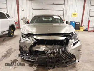 2021 Lexus ES 250 z VIN 58AD11D11MU007968, wystawiony jako IAAI lot #41968246 z przebiegiem 11 522 mil mil oraz . Historia ofert i sprzedaży dostępna na DreamBid. Obrazek 6.