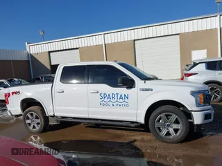 2018 Ford F-150 XL with VIN 1FTEW1EG1JKE29623, listed as a IAAI auction lot 40615703 with 122,846 mi miles and . Bid and sale history available at DreamBid. Image 13.