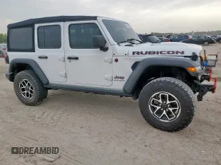 2024 Jeep Wrangler Rubicon with VIN 1C4PJXFG2RW266901, listed as a Copart auction lot 60641445 with 3,908 mi miles and Salvage title. Bid and sale history available at DreamBid. Image 4.