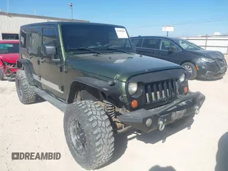 2007 Jeep Wrangler Unlimited X with VIN 1J4GA39177L162946, listed as a IAAI auction lot 41482859 with 216,753 mi miles and . Bid and sale history available at DreamBid. Image 1.