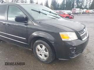 2009 Dodge Grand Caravan SXT with VIN 2D8HN54119R569142, listed as a IAAI auction lot 42000421 with 161,717 mi miles and . Bid and sale history available at DreamBid. Image 6.