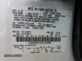 2007 Ford Five Hundred SEL with VIN 1FAHP24157G154398, listed as a Copart auction lot 74328764 with 196,601 mi miles and Salvage Title. Bid and sale history available at carsss.com. Image 14.