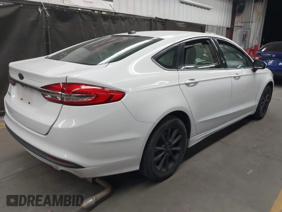 2017 Ford Fusion S with VIN 3FA6P0G72HR222095, listed as a IAAI auction lot 42151178 with 108,001 mi miles and . Bid and sale history available at DreamBid. Image 4.