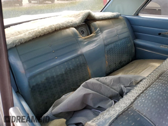 1964 Chevrolet Impala z VIN 41847J219664, wystawiony jako Copart lot #75891214 z przebiegiem 47 312 mil mil oraz Szkoda całkowita • Salvage title. Historia ofert i sprzedaży dostępna na DreamBid. Obrazek 10.