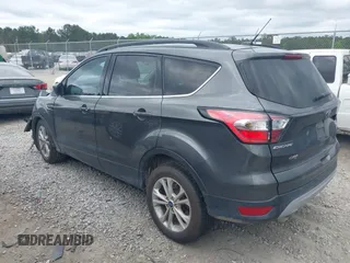 2017 Ford Escape SE z VIN 1FMCU0GD8HUE00754, wystawiony jako IAAI lot #42127911 z przebiegiem 169 487 mil mil oraz . Historia ofert i sprzedaży dostępna na DreamBid. Obrazek 14.