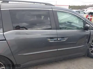 2011 Honda Odyssey EX-L with VIN 5FNRL5H61BB097069, listed as a IAAI auction lot 41723100 with 252,529 mi miles. Bid and sale history available at carsss.com. Image 13.