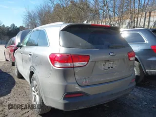 2016 Kia Sorento LX with VIN 5XYPGDA39GG061748, listed as a IAAI auction lot 41720011 with 124,084 mi miles. Bid and sale history available at carsss.com. Image 12.