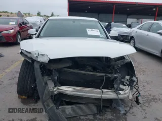 2014 Audi A4 Premium Plus z VIN WAUFFAFL2EN021407, wystawiony jako IAAI lot #42418122 z przebiegiem 226 243 mil mil oraz . Historia ofert i sprzedaży dostępna na DreamBid. Obrazek 12.