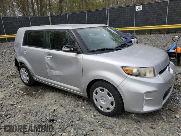 2014 Scion xB with VIN JTLZE4FE0EJ049899, listed as a Copart auction lot 52962125 with 120,791 mi miles and Salvage Title. Bid and sale history available at carsss.com. Image 4.