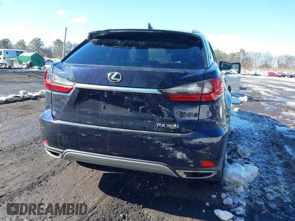 2021 Lexus RX with VIN 2T2HZMDA4MC277227, listed as a IAAI auction lot 41527380 with 52,580 mi miles. Bid and sale history available at carsss.com. Image 16.