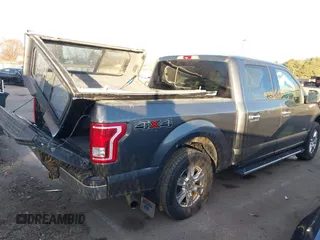 2015 Ford F-150 XLT with VIN 1FTEW1EP1FKE16670, listed as a IAAI auction lot 41120641 with 102,770 mi miles. Bid and sale history available at carsss.com. Image 4.