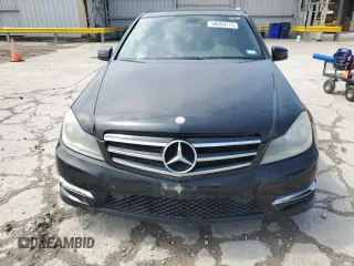 2014 Mercedes-Benz C 250 Sport z VIN WDDGF4HB9EA934191, wystawiony jako Copart lot #56050175 z przebiegiem 186 887 mil mil oraz Szkoda całkowita • Salvage title. Historia ofert i sprzedaży dostępna na DreamBid. Obrazek 5.