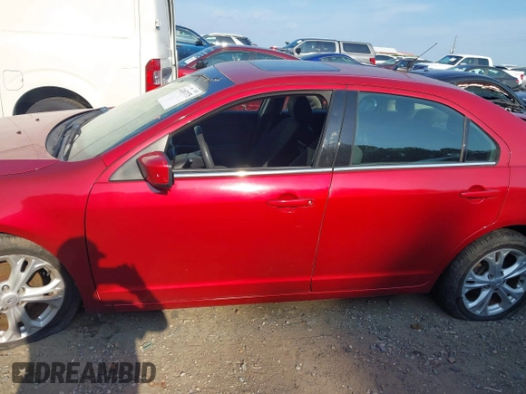2012 Ford Fusion SE with VIN 3FAHP0HA0CR386683, listed as a IAAI auction lot 42487175 with 104,823 mi miles and . Bid and sale history available at DreamBid. Image 14.