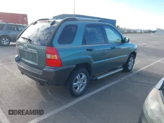 2008 Kia Sportage LX with VIN KNDJE723787521869, listed as a IAAI auction lot 41854551 with 167,997 mi miles. Bid and sale history available at carsss.com. Image 4.