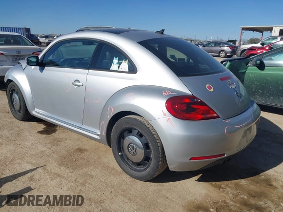 2013 Volkswagen Beetle 2.5L w/Sun/Sound/Nav with VIN 3VWJX7AT3DM663774, listed as a IAAI auction lot 41738146 with 98,064 mi miles and . Bid and sale history available at DreamBid. Image 3.