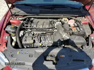 2013 Ford Taurus Limited z VIN 1FAHP2F84DG217500, wystawiony jako Copart lot #64268005 z przebiegiem 120 277 mil mil oraz Szkoda całkowita • Salvage title. Historia ofert i sprzedaży dostępna na DreamBid. Obrazek 11.
