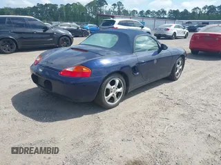2002 Porsche Boxster with VIN WP0CA29812U622973, listed as a IAAI auction lot 42104707 with 56,744 mi miles and . Bid and sale history available at DreamBid. Image 4.