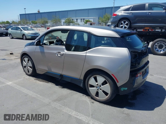 2014 BMW i3 with VIN WBY1Z4C56EV276183, listed as a IAAI auction lot 42345866 with 102,934 mi miles and . Bid and sale history available at DreamBid. Image 3.