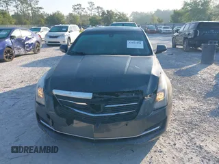 2015 Cadillac ATS Sedan Luxury RWD with VIN 1G6AB5RX4F0122156, listed as a IAAI auction lot 42012891 with 137,879 mi miles. Bid and sale history available at carsss.com. Image 12.