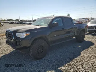 2021 Toyota Tacoma SR5 z VIN 3TMBZ5DN7MM029984, wystawiony jako Copart lot #69456094 z przebiegiem 59 257 mil mil oraz Szkoda całkowita • Salvage title. Historia ofert i sprzedaży dostępna na DreamBid. Obrazek 1.
