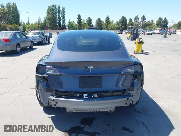 2023 Tesla Model 3 with VIN 5YJ3E1EAXPF405588, listed as a IAAI auction lot 42348952 with 30,788 mi miles and . Bid and sale history available at DreamBid. Image 17.