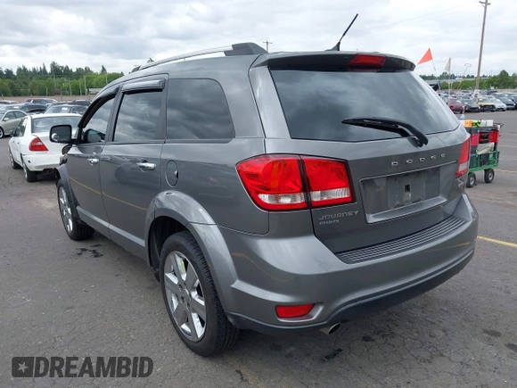 2012 Dodge Journey Crew with VIN 3C4PDDDG4CT213848, listed as a IAAI auction lot 42228688 with 143,406 mi miles and . Bid and sale history available at DreamBid. Image 3.