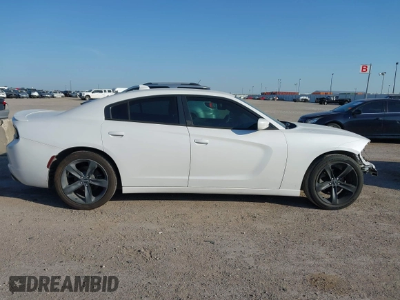 2015 Dodge Charger SXT with VIN 2C3CDXHG8FH730145, listed as a IAAI auction lot 42039927 with 156,135 mi miles and . Bid and sale history available at DreamBid. Image 14.