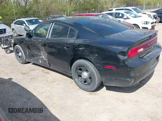 2013 Dodge Charger Police with VIN 2C3CDXAG5DH546384, listed as a IAAI auction lot 42021401 with 154,637 mi miles and . Bid and sale history available at carsss.com. Image 3.
