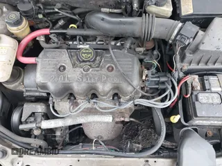 2003 Ford Focus LX with VIN 1FAFP33P33W267575, listed as a IAAI auction lot 41804406 with 106,957 mi miles and . Bid and sale history available at carsss.com. Image 10.