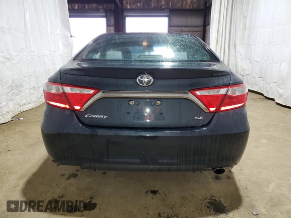 2015 Toyota Camry XLE with VIN 4T1BF1FK3FU077674, listed as a Copart auction lot 52679985 with 128,417 mi miles and Salvage Title. Bid and sale history available at DreamBid. Image 6.