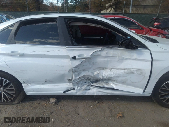 2021 Volkswagen Jetta S z VIN 3VWC57BU1MM017025, wystawiony jako IAAI lot #31656882 z przebiegiem 20 664 mil mil oraz . Historia ofert i sprzedaży dostępna na DreamBid. Obrazek 6.