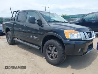 2013 Nissan Titan SV with VIN 1N6AA0EC4DN302479, listed as a IAAI auction lot 42383255 with 112,991 mi miles and . Bid and sale history available at DreamBid. Image 1.