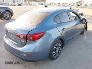 2015 Mazda 3 i Sport with VIN 3MZBM1U75FM145709, listed as a IAAI auction lot 41950471 with 124,407 mi miles and . Bid and sale history available at carsss.com. Image 4.