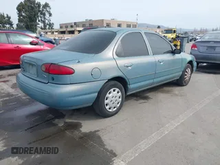 1997 Ford Contour LX with VIN 1FALP6533VK156310, listed as a IAAI auction lot 41567292 with 79,619 mi miles and . Bid and sale history available at DreamBid. Image 4.
